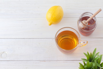lemon honey tea on wood table with copy space