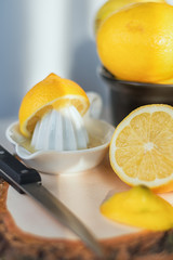 sliced lemon on a wooden board.