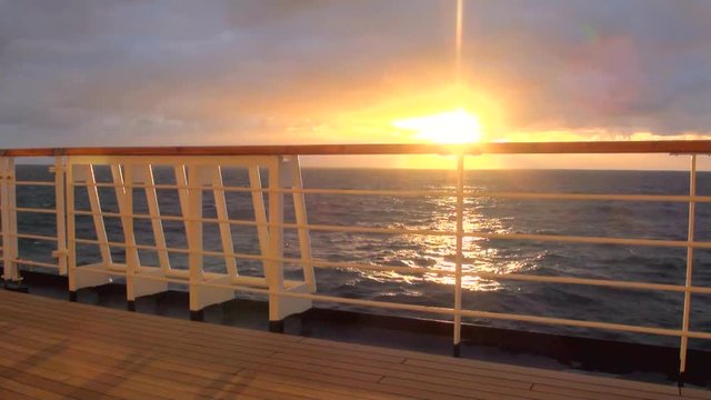 Sunset in Chilean Fjord - Deck railing of cruise ship in the Pacific Ocean - Travel Destination - South America - Cruising Antarctica