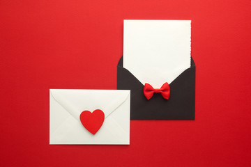 Envelope Mail, Heart and Ribbon on red Background. Valentine Day Card, Love or Wedding Greeting Concept. Top view