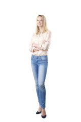 Confident mature female portrait. Full length shot of a smiling middle aged woman wearing casual clothing while standing at isolated white background. 