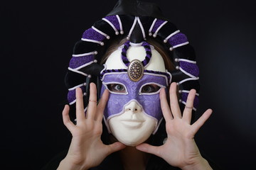 blonde with a theatrical mask