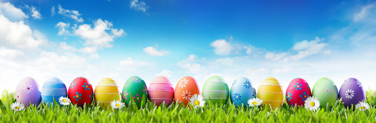 Easter Banner - Colorful Painted Eggs In Row On Grass
