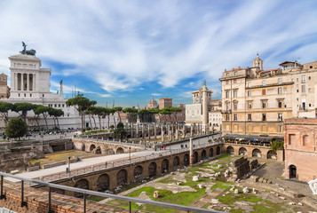 Fototapeta na wymiar Rome, Italy. Ruins Market and Trajan Forum, (100 - 112 years AD). Vittoriano Monument on Capitol Hill