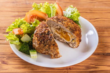 scotch egg with vegetables