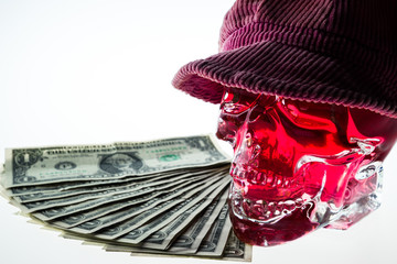 Red skull with cap and money