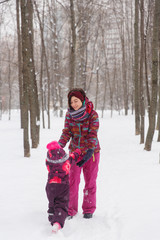 Winter photo of mother ,baby