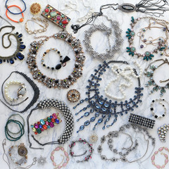 Colorful fashion jewellery on marble background