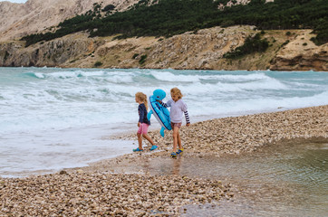 smiling children having fun in the beach