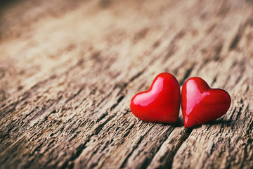 Love  -  Valentines Day Background  -  Two hearts on rustic wood 