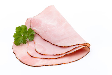 Thin slices of ham on white background.