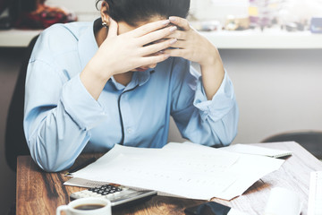 woman working at  documents