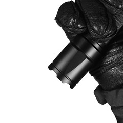 Gloved Hand Holding Tactical Flashlight Bright Light Brightly Lit Strike Bezel Black Grain Leather Glove Cop Jacket, Isolated Vertical Closeup, Police Security Guard Policeman Patrol, Forensic Officer