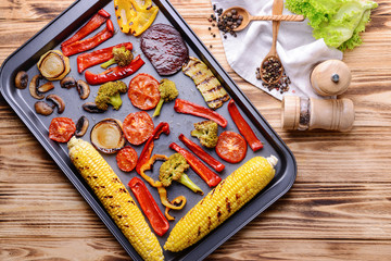 Fototapeta na wymiar Grilled vegetables on baking tray