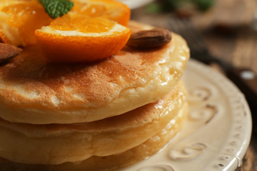 Stack of fresh pancakes on plate