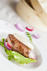 Gua bao, steamed sandwich, grilled pork bun with vegetables,pres