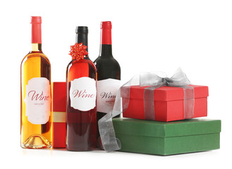 St. Valentines Day concept. Three wine bottles and gift boxes isolated on white