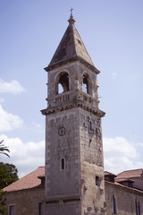 Fototapeta na wymiar Church tower in Kastel Sucurac, Croatia