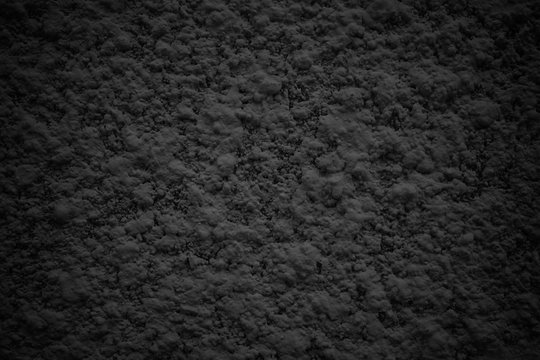 black abstract wall, dark cement texture as background