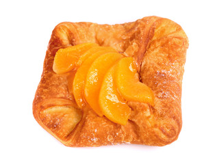 Fresh bun covered with mandarin slices