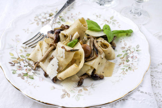 Traditional Italian Pappardelle ai Pioppini as close-up on a plate