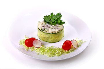 Olivier salad with cabbage, cherry tomatoes and radish