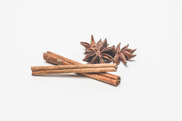 cinnamon stick and star anise spice isolated on white background closeup