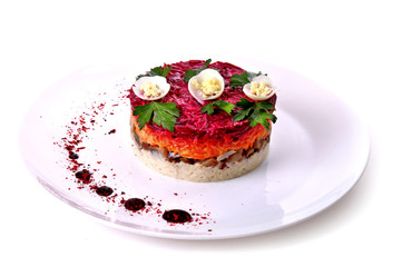 Salad of mushrooms, eggs, carrot and beet