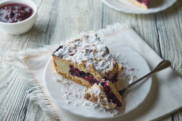 Delicious homemade pie with currants and coffee