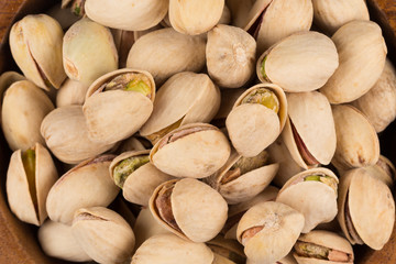 Heap of salted pistachio nuts