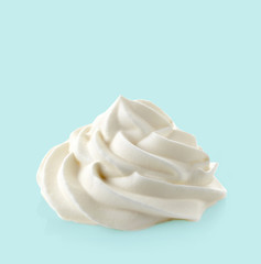 whipped cream on blue background