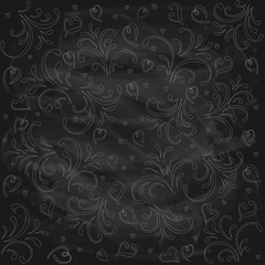 Valentines ornament on black chalkboard