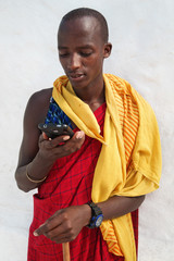 Masai using smart phone