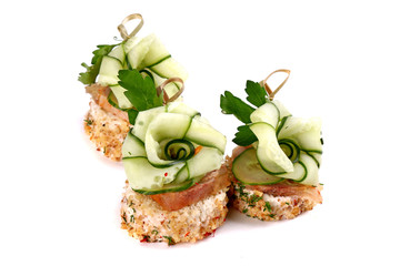 Three meat and cucumber canapes