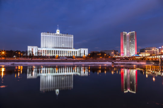 The view of the government house of the Russian Federation and Moscow and their reflection in the Moscow river, Moscow, Russia