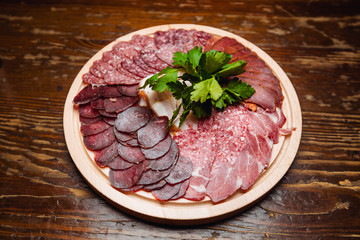 a plate of cold meats