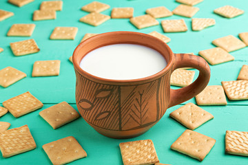 healthy breakfast cup of milk and crackers, close up, top vew