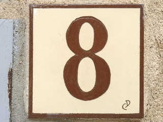 Ceramic tile with numer eight 8