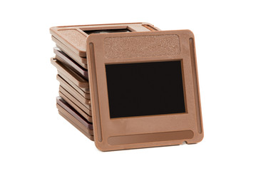 Stack of photo slides on white background