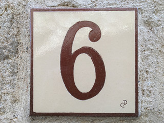 Ceramic tile with numer six 6
