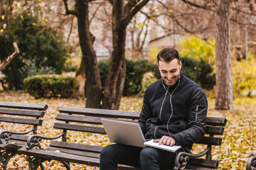 Fototapeta premium Handsome guy working outside the office