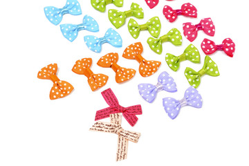 Rows of multicolored bows on white background - scrapbooking elements