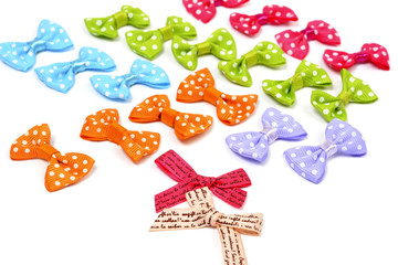 Rows of multicolored bows on white background - scrapbooking elements