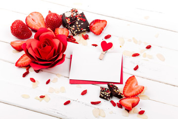 Empty  card with strawberry, red rose and chocolate