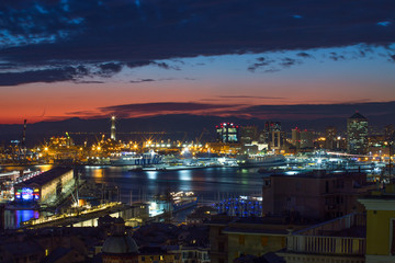 Fototapeta na wymiar GENOA (GENOVA), ITALY, JANUARY, 24, 2017 - View of the port at night of Genoa (Genova), Italy