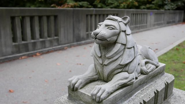Motion of lion statue on Lions Gate Bridge at Stanley Park in Vancouver BC Canada
