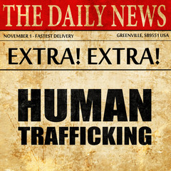Fototapeta premium human trafficking, newspaper article text