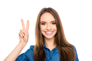 Portrait of cheerful happy brunette woman showing two fingers