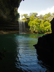 A waterfall at a limestone rock formation at Hamilton Pool Preserve near Austin, Texas.