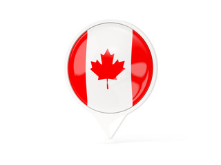 Round white pin with flag of canada
